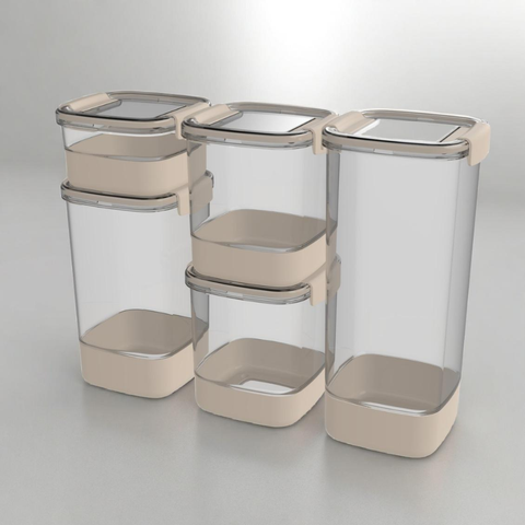 Set of clear storage containers with beige lids on a gray background
