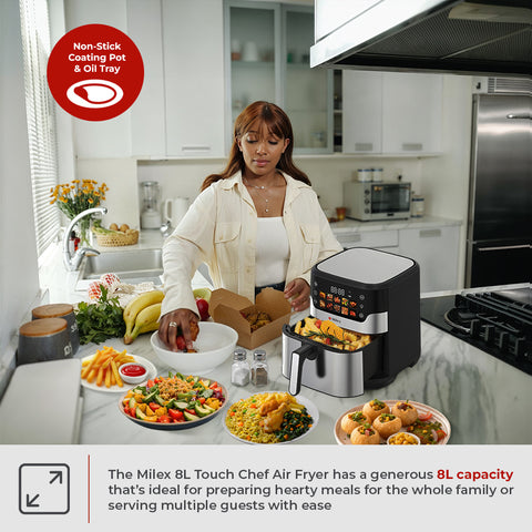 Woman using a Milex 8L Touch Chef Air Fryer in a kitchen setting.