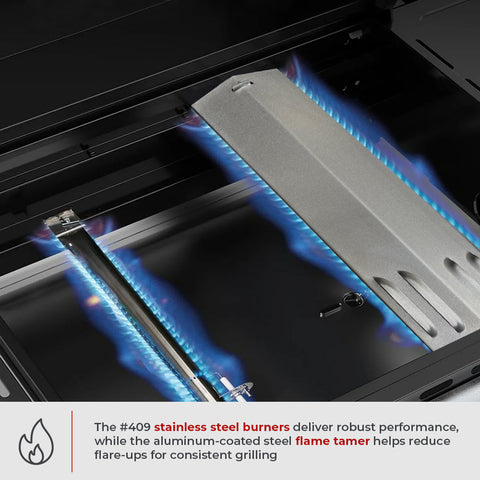 Close-up of a gas grill with stainless steel burners and flame tamer, highlighting robust performance and consistent grilling.