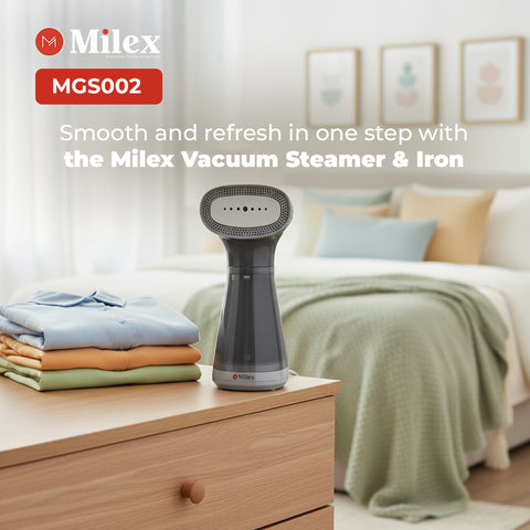 Milex Vacuum Steamer & Iron on a dresser with folded clothes in a bedroom setting