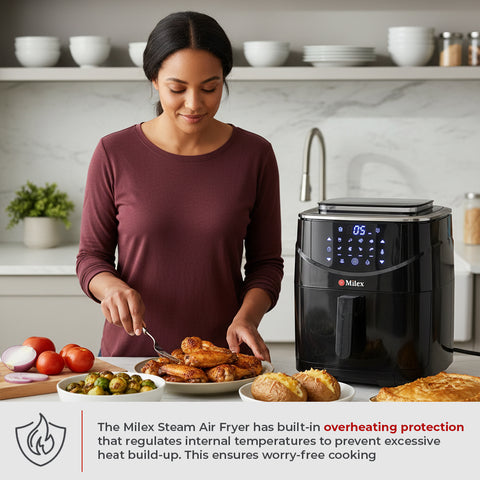 Woman in a kitchen with a Milex steam air fryer, surrounded by food and kitchenware.