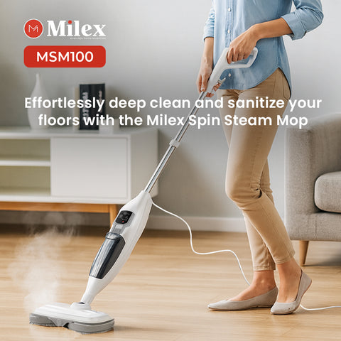 Person using a Milex Spin Steam Mop on a wooden floor in a living room.