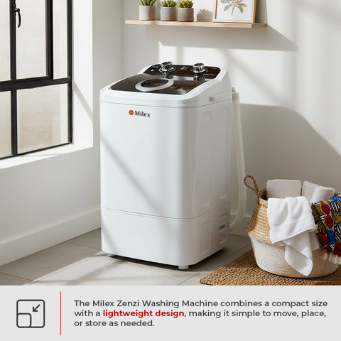 White Milex Zenzi washing machine in a room with a basket of laundry.