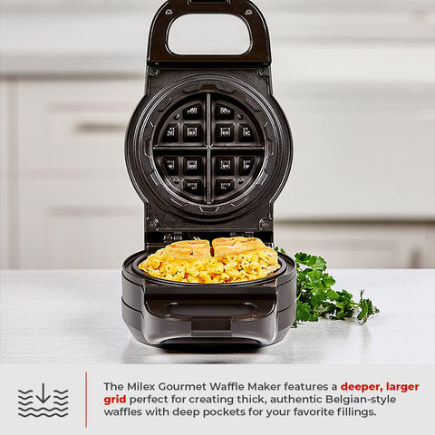 Milex Gourmet Waffle Maker with waffles and food inside on a white surface.