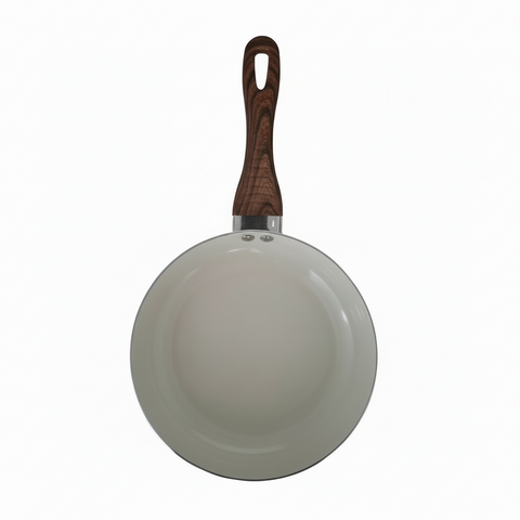 Frying pan with wooden handle on a white background